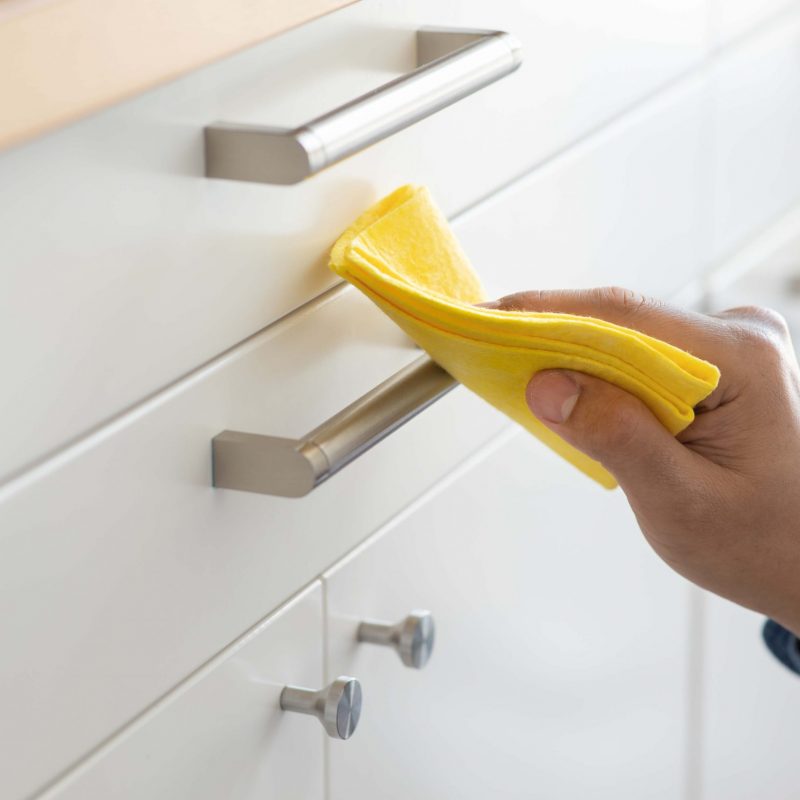 Prevention concepts on coronavirus ( covid-19 ) outbreak situation with person cleaning kitchen furniture by alcohol.body health care.protect yourself.healthy lifestyle